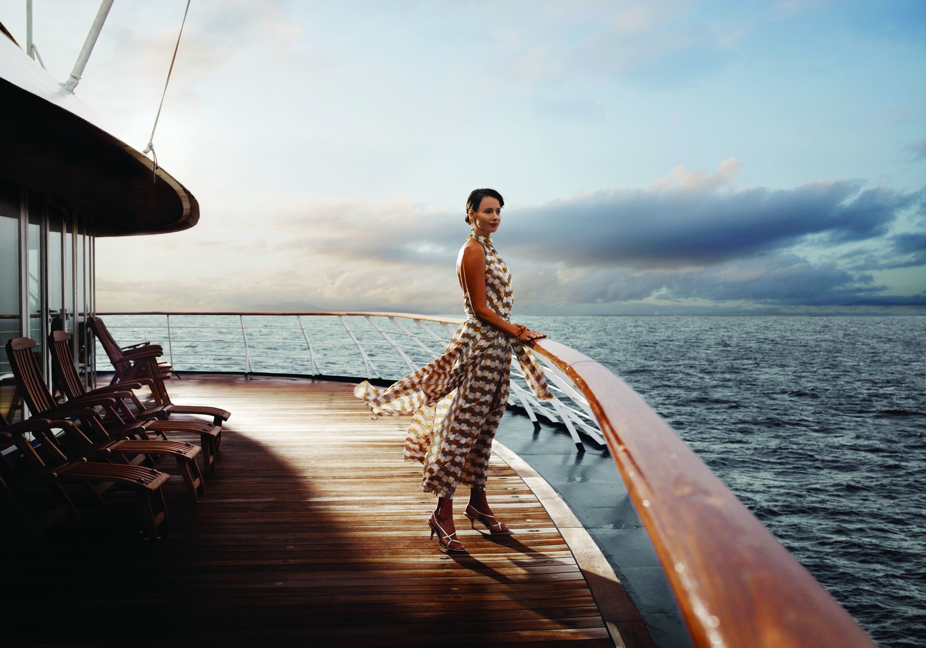 yacht-deck-sun-loungers-sea-water